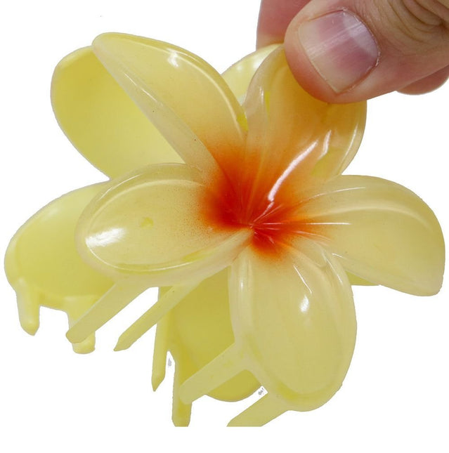 Bloem Haarclip Geel van Fiestas Guirca koop je bij Partywinkel