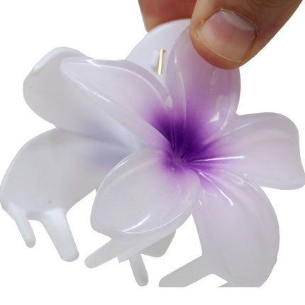Bloem Haarclip Paars van Fiestas Guirca koop je bij Partywinkel