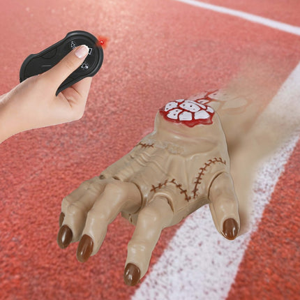 Halloween Nep Hand Beweegbaar Met Afstandsbediening 18cm van Fiestas Guirca koop je bij Partywinkel