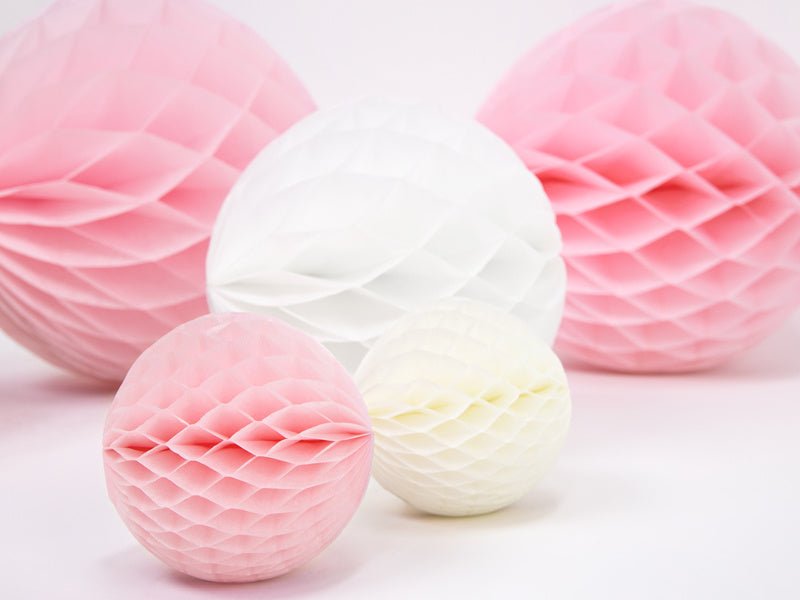 Honeycomb Bal Lichtroze 10cm van Partydeco koop je bij Partywinkel